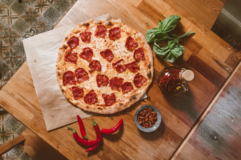 Spicy Diavola pizza with hot salami and chili flakes